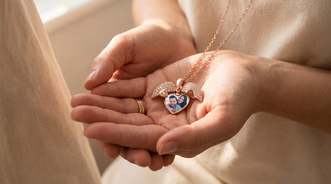 Crystal Heart Photo Locket Necklace in gold held in a woman's cupped hands