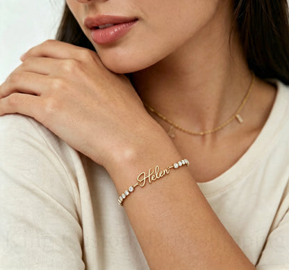 Custom signature name tennis bracelet worn on wrist, personalized as Helen