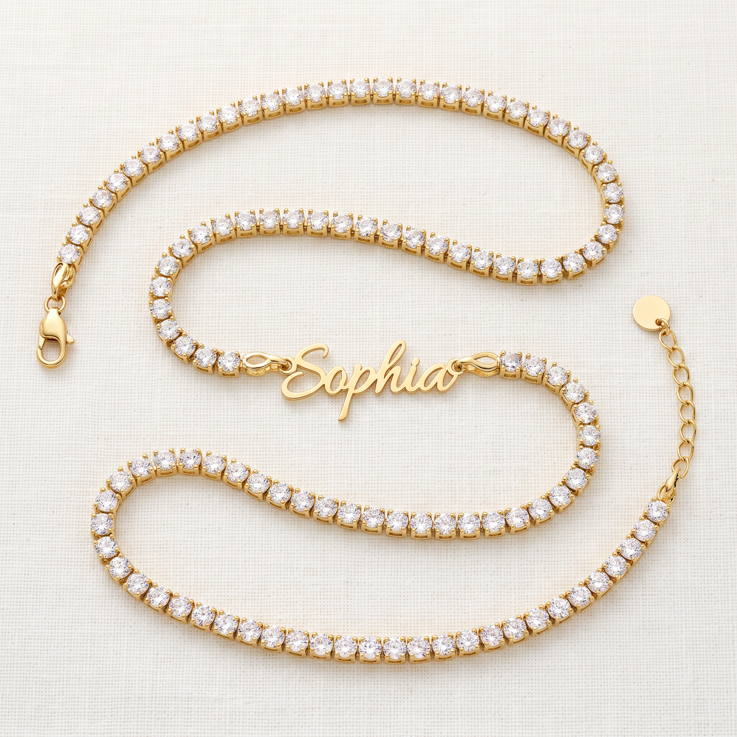 Custom signature name tennis necklace, full length flat lay in gold