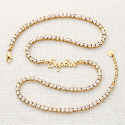 Custom signature name tennis necklace, full length flat lay in gold