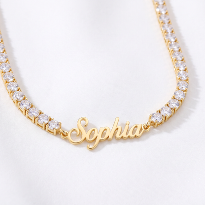 Custom signature name tennis necklace, close up in gold with name plate