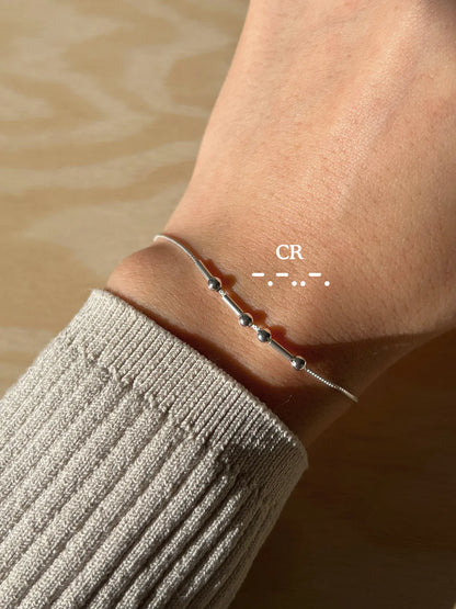 Personalized Morse code bracelet — secret message encoded in beads, worn openly for couples and best friends