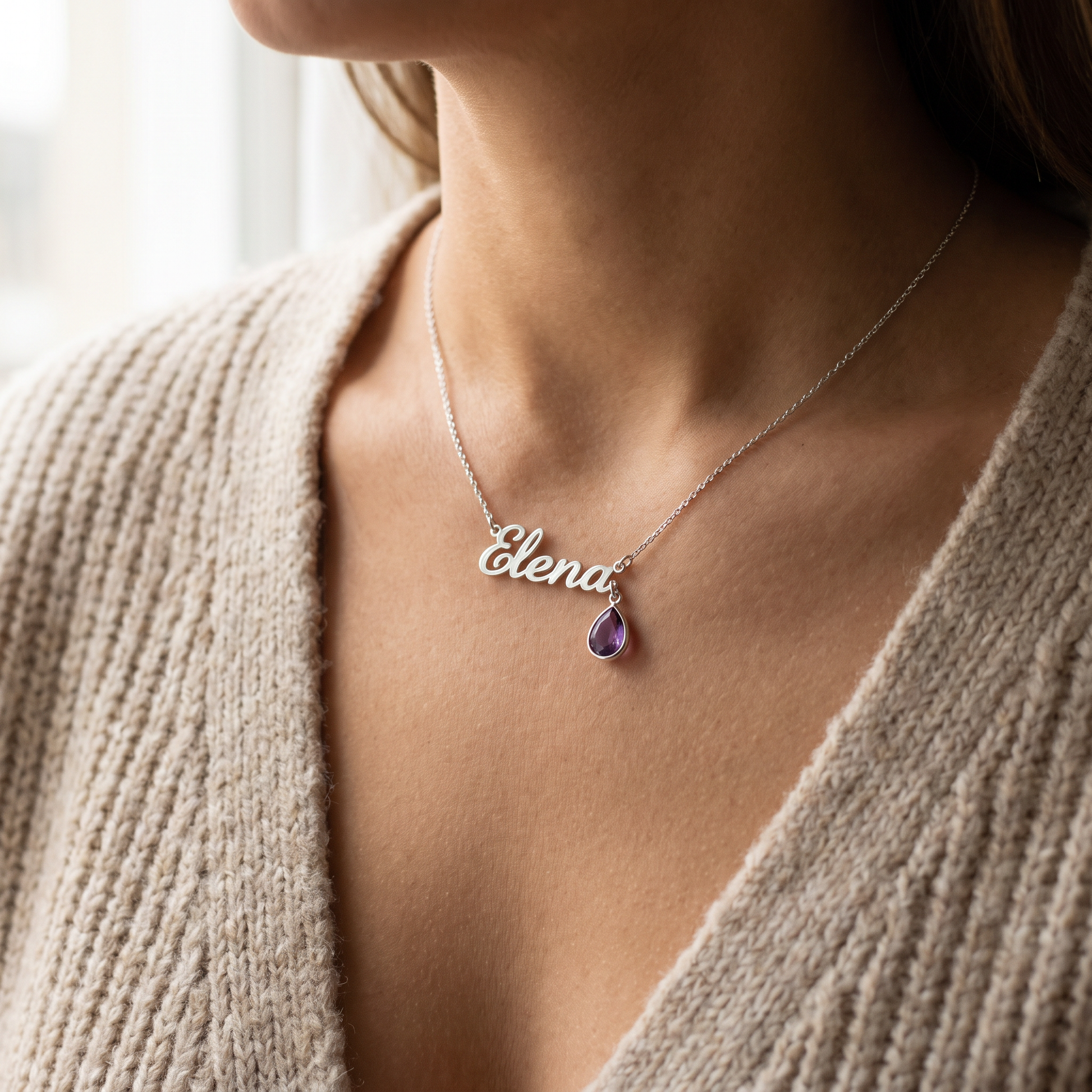 Silver personalized name necklace with amethyst birthstone worn on neck