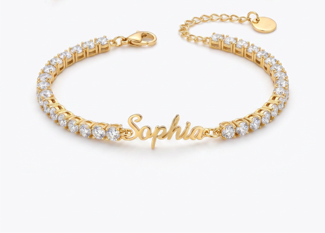 Custom signature name tennis bracelet, close up flat lay in gold