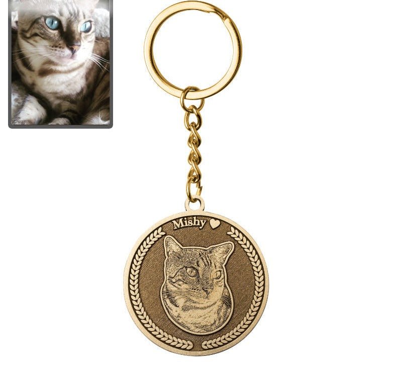 Cat memorial medallion photo keychain in titanium gold — embossed cat loss keepsake pendant