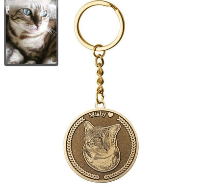 Cat memorial medallion photo keychain in titanium gold — embossed cat loss keepsake pendant